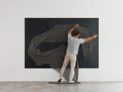 Designer Luis Pons artist makes large magnetic panel